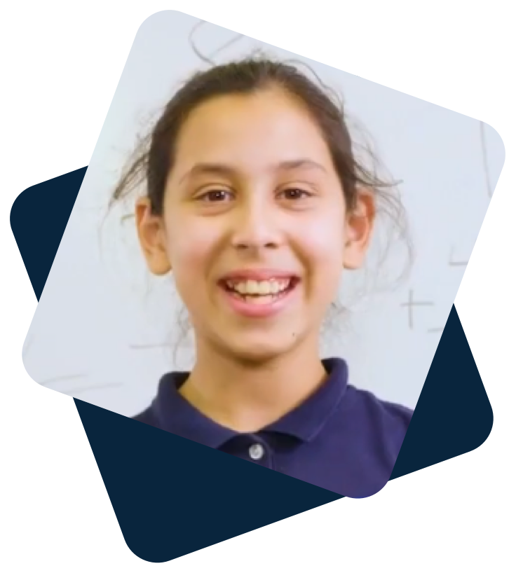 Female student smiling with blue background behind her